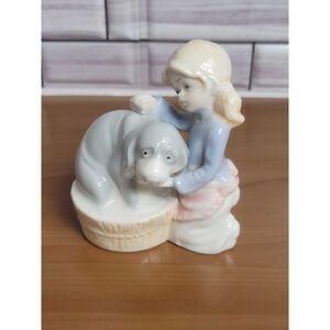Vintage Porcelain Figurine Girl giving dog a bath